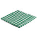 A green and white checkered Intedge vinyl table cover on a table.