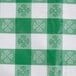 A green and white checkered Intedge vinyl table cover.