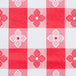 A red and white checkered Intedge vinyl table cover.