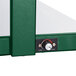 A close-up of the thermostatic control dial on a green and white Hatco buffet warmer.