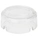 An Arcoroc round glass ashtray on a white background.