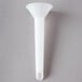 A white Vollrath sausage stuffer tube.