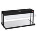 A black Hatco countertop buffet warmer with glass shelves.