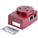 A red metal box with a hole in the middle.