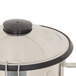 A white Hamilton Beach blender fill cap with a lid.