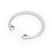 A silver Waring retaining ring with two holes.