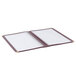 A burgundy quad panel Menu Solutions menu jacket with 8 open views.