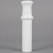 A white plastic pusher with a small hole at the bottom.