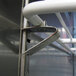 An Arctic Air wire shelf kit with metal hooks and bars.