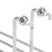 Two Avantco chrome metal heating elements with handles.