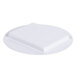 A white plate with a circular object on it.