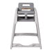 A gray Koala Kare high chair with a seat and tray.