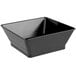 A black square serving basket with a triangular design.