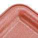 A close up of a red HS Inc. Paprika Tamale Server tray.
