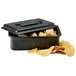 A black HS Inc. tamale server with food in it.