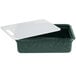 A white cutting board in a green plastic container with a white lid.