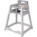 A gray Koala Kare high chair with a white frame.