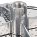 A Robot Coupe hard cheese grating disc, a metal disc with holes.