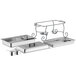 A Choice stainless steel chafer tray on a black wrought iron rack.