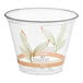 A clear plastic squat cold cup with a leaf design and eco-friendly branding.