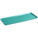 A rectangular green Cambro market tray with a handle.