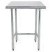 An Advance Tabco stainless steel work table with a square top on a metal frame.