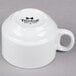 A Tuxton bright white china cup with a handle.