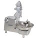 A Hobart commercial food processor with a bowl and blade on top.