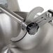 A Hobart commercial food processor with a metal bowl and blade attachment.