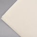 A stack of ivory Hoffmaster paper dinner napkins.