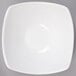 An American Metalcraft square stoneware bowl on a gray surface.