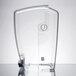 a clear plastic container with a hole