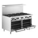A large stainless steel commercial range with ten burners and two open oven compartments.