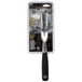 A black and white Mercer Culinary Genesis Forged Pot Fork in packaging.