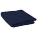 A folded navy blue table cover on a white background.