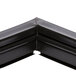 A black magnetic door gasket corner with a black border.