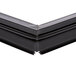 A close up of a black True magnetic door gasket corner.