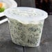 a plastic container with food in it