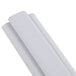 A close-up of two white plastic tubes.