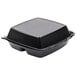 A Dart black foam container with a square lid.