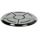 A close-up of a WNA Comet black circular catering tray with a cross pattern.