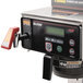 A Bunn Axiom 15-3 automatic coffee brewer on a counter.