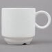 An Arcoroc white porcelain mug with a handle.