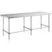 A long rectangular stainless steel work table with metal legs.