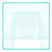 A clear plastic square bowl with a green border.