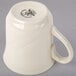 a white mug with a handle