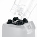 A close-up of a black and white Hamilton Beach blender with a white lid on the jar.