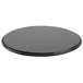 A black round Chicago Metallic BAKALON pizza pan.