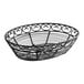 A Tablecraft black metal oval basket with swirls.