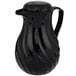 A black Vollrath SwirlServe hot-n-cold beverage server with a handle.